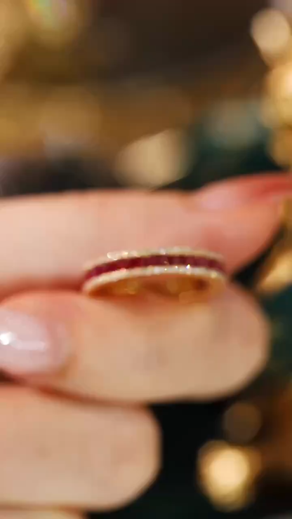 18k gold ring set with a 0.30-carat natural diamond and a 1.10-carat natural ruby. The ring features a bezelless setting design with straight lines.