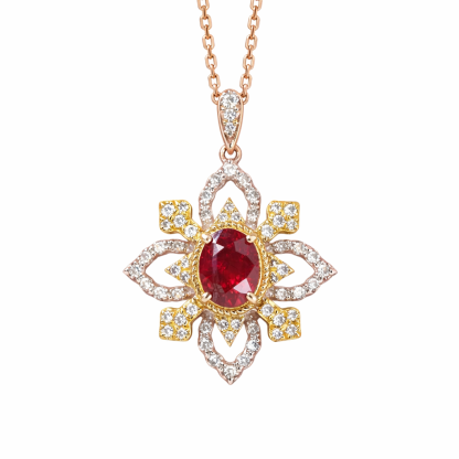 18k gold necklace set with an oval ruby of 0.38 carats, as well as additional stones of 0.22 carats each.