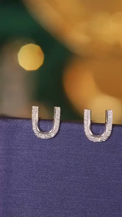 18k gold earring stud with the letter “U” and a 0.10ct natural diamond inlaid.