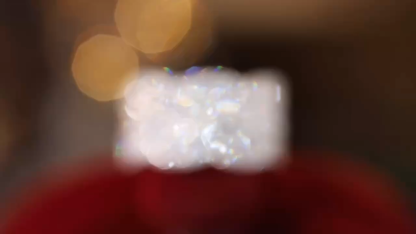 18k gold ring set with a natural diamond; the diamond features a Tapered Baguette cut and weighs 0.65carats.