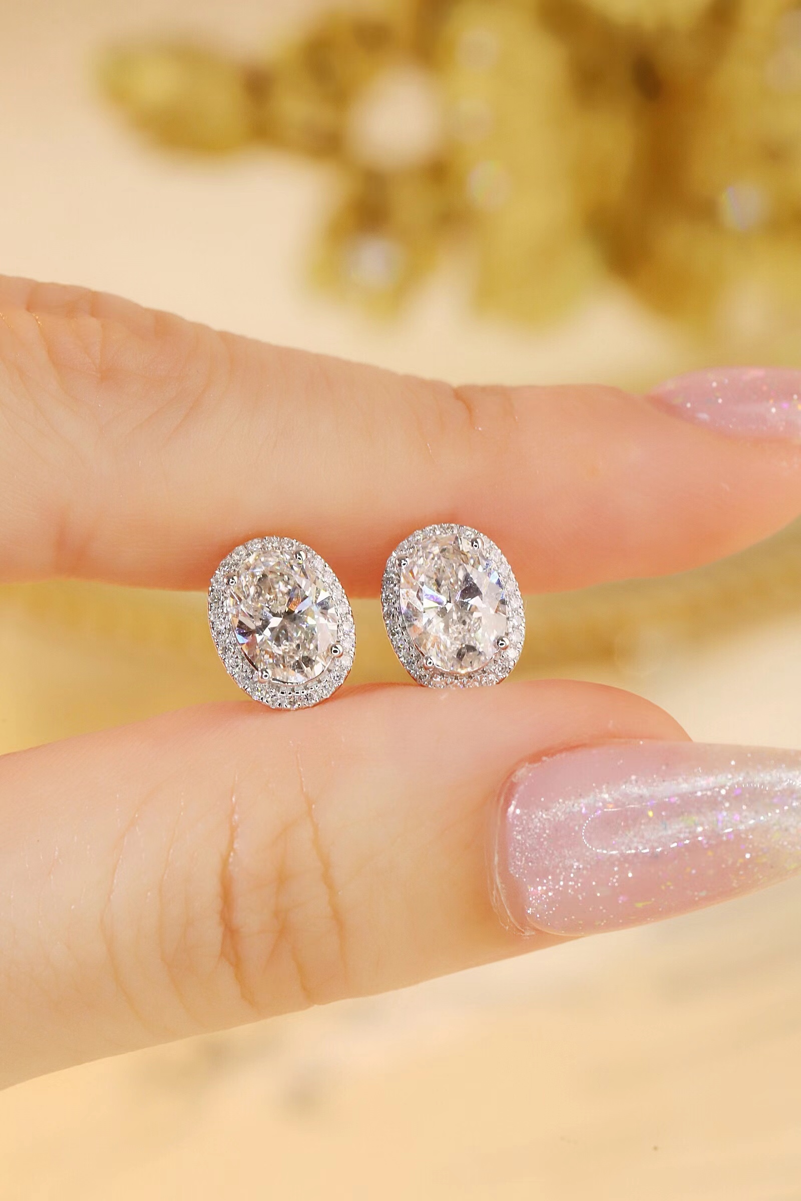 10K gold carat oval diamond earrings with four-prong setting