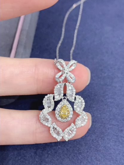 18k gold necklace with yellow diamonds, natural diamond weighing 1.22ct