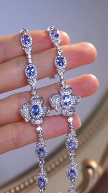 Flowers  18k Gold Bracelet with Luxuriously Set Sapphires and Diamonds totaling 5.70ct