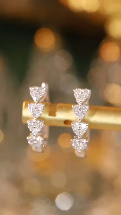 18k gold earrings with 0.66ct natural diamond