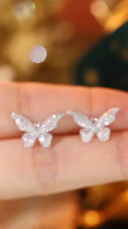 18k gold earrings with a bow design, featuring a natural diamond of 0.46carats