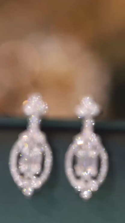 18k gold earrings set with a 1.00ct natural diamond