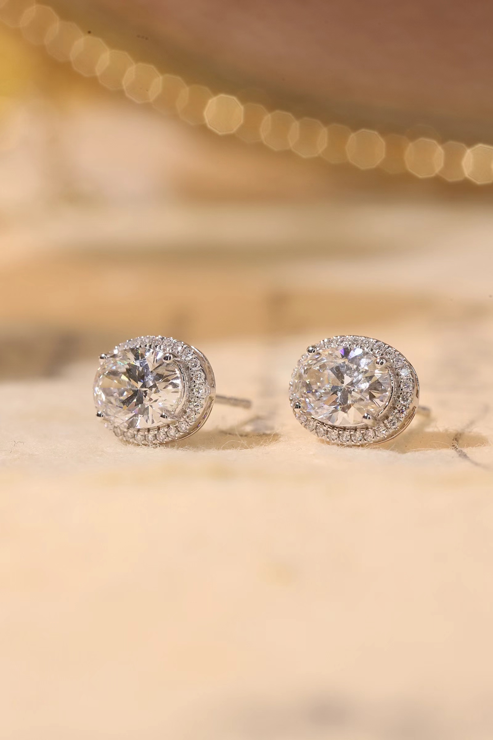 10K gold carat oval diamond earrings with four-prong setting