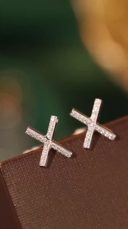 18k gold earring stud with the letter “X” and a 0.08ct natural diamond inlaid.
