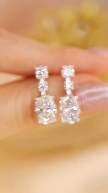 10K gold carat oval diamond earrings with four-prong setting