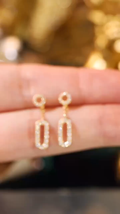 18k gold earrings set with a 0.38ct natural diamond