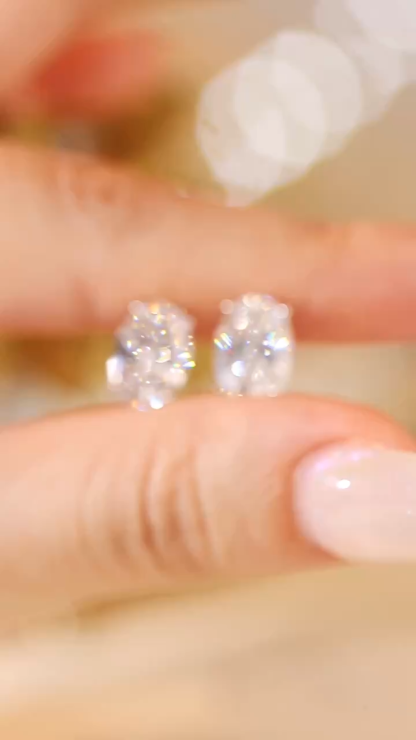 10K gold 1-carat oval diamond earrings with four-prong setting