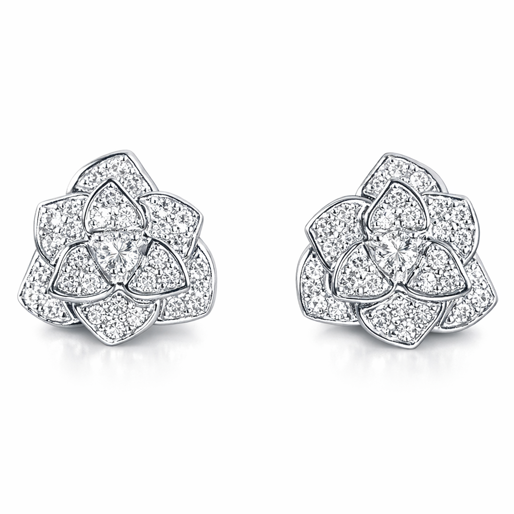 18-karat gold earrings set with a natural diamond of 0.42 carats, in a cluster setting.Camellia flowers