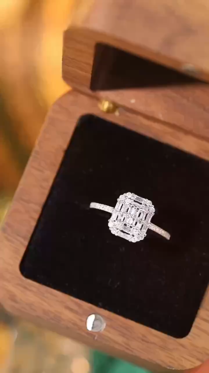 18k gold ring set with a natural diamond; the diamond features a Tapered Baguette cut and weighs 0.50 carats.