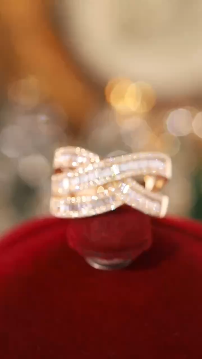 18k gold ring set with a natural diamond; the diamond features a Tapered Baguette cut and weighs 0.75carats.