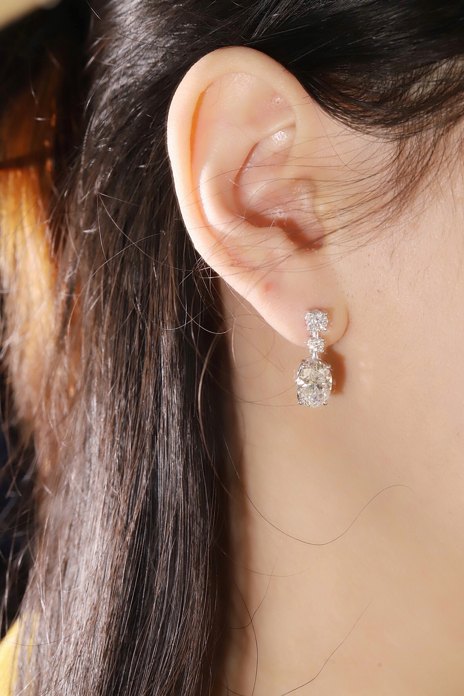 10K gold carat oval diamond earrings with four-prong setting