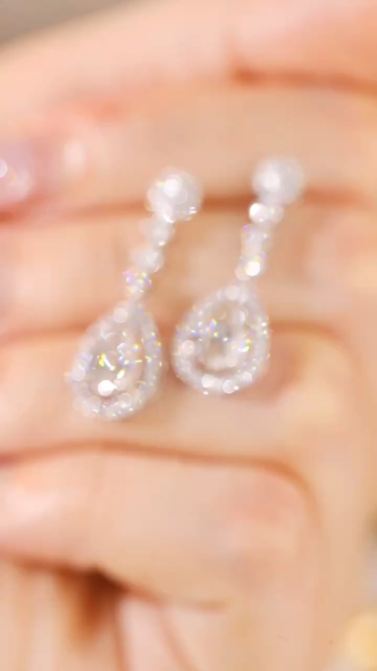 10k Gold Diamond Earrings: Droplet-cut 3.00ct Cultured Diamond, set in a three-prong design for an elegant look