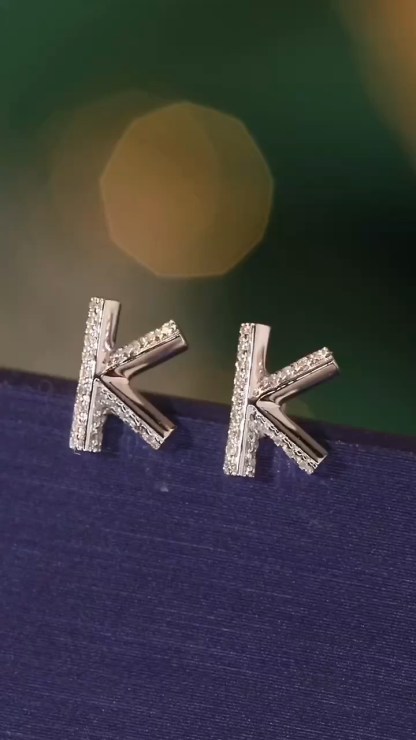 18k gold earring stud with the letter “K” and a 0.08ct natural diamond inlaid.