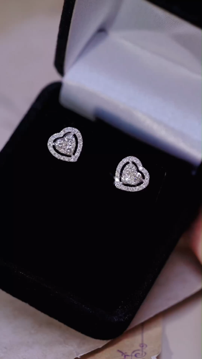 18k gold stud earrings set with 0.60ct diamond prong Love