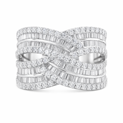 18k gold ring set with a natural diamond; the diamond features a Tapered Baguette cut and weighs 1.45carats.