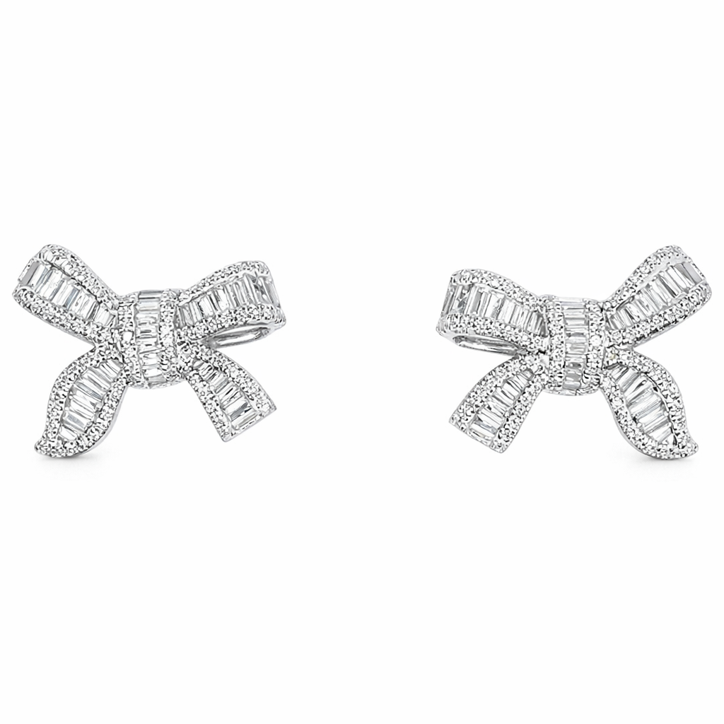 18-karat gold earrings in the shape of a butterfly, featuring a natural diamond of 1.00 carats set in a tapered baguette cut within a channel setting.