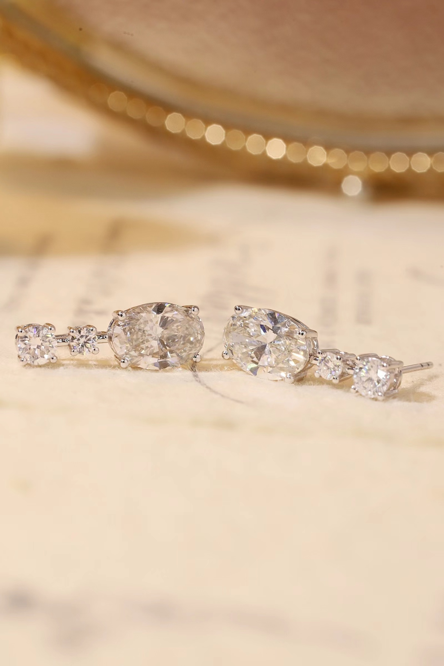 10K gold carat oval diamond earrings with four-prong setting