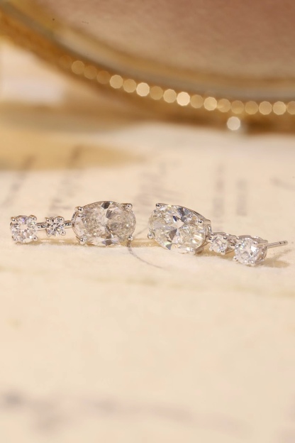 10K gold carat oval diamond earrings with four-prong setting