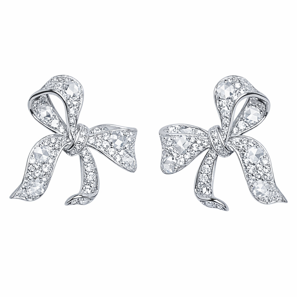 18k gold earrings with a bow design, featuring a natural diamond of 0.90carats.Rose Cut