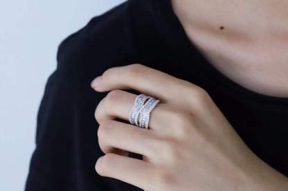 18k gold ring set with a natural diamond; the diamond features a Tapered Baguette cut and weighs 1.45carats.