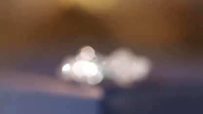 18k gold ring set with a natural diamond; the diamond features a Tapered Baguette cut and weighs 0.20 carats.