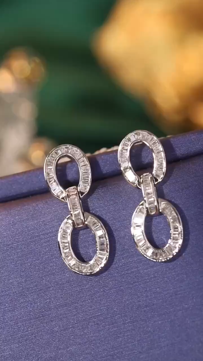 18k gold earrings set with 0.70ct natural diamond