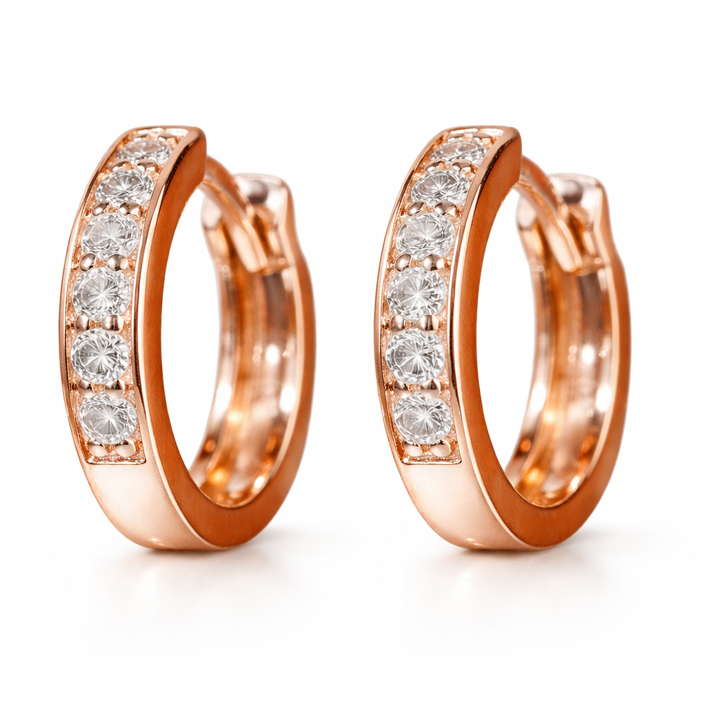 18-karat gold earrings set with a natural diamond of 0.18 carats, in a cluster setting.