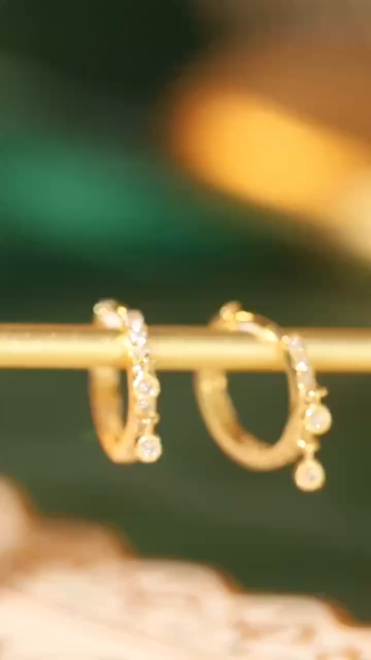 18k gold earrings with 0.20ct natural diamond