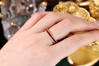18k gold ring set with a 0.30-carat natural diamond and a 1.10-carat natural ruby. The ring features a bezelless setting design with straight lines.
