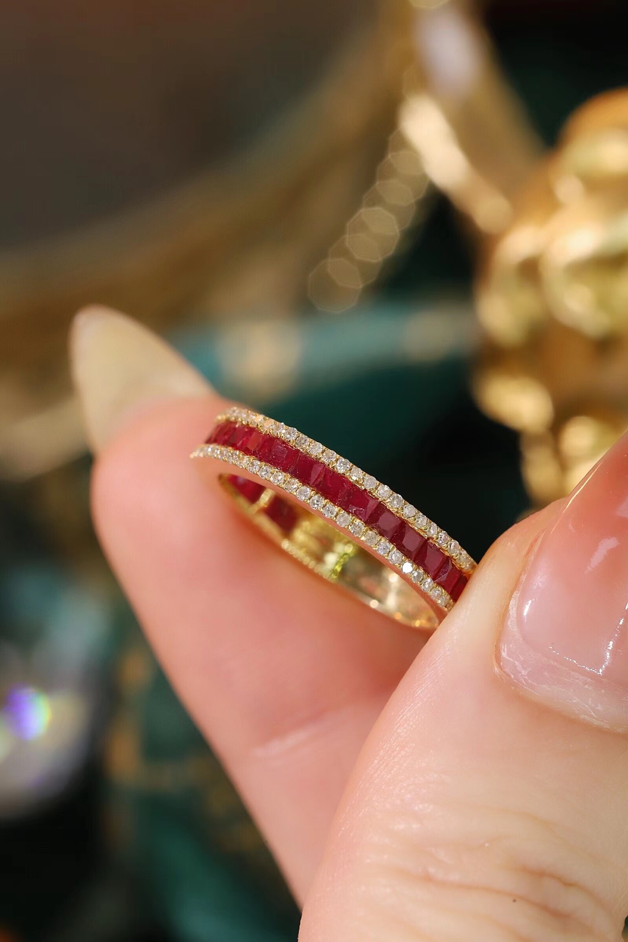 18k gold ring set with a 0.30-carat natural diamond and a 1.10-carat natural ruby. The ring features a bezelless setting design with straight lines.