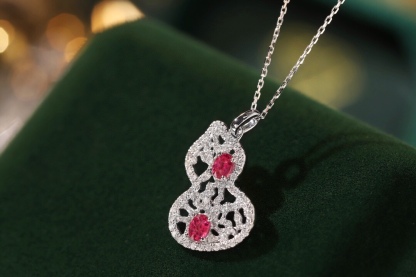 18k gold necklace gourd shape four claws inlaid with oval ruby 0.45ct accessory stone 0.35ct.