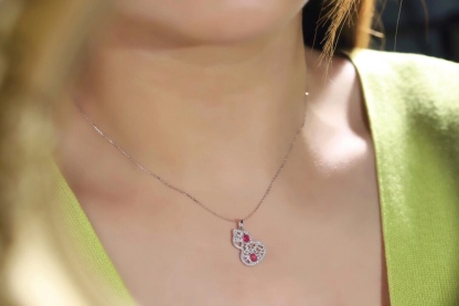18k gold necklace gourd shape four claws inlaid with oval ruby 0.45ct accessory stone 0.35ct.