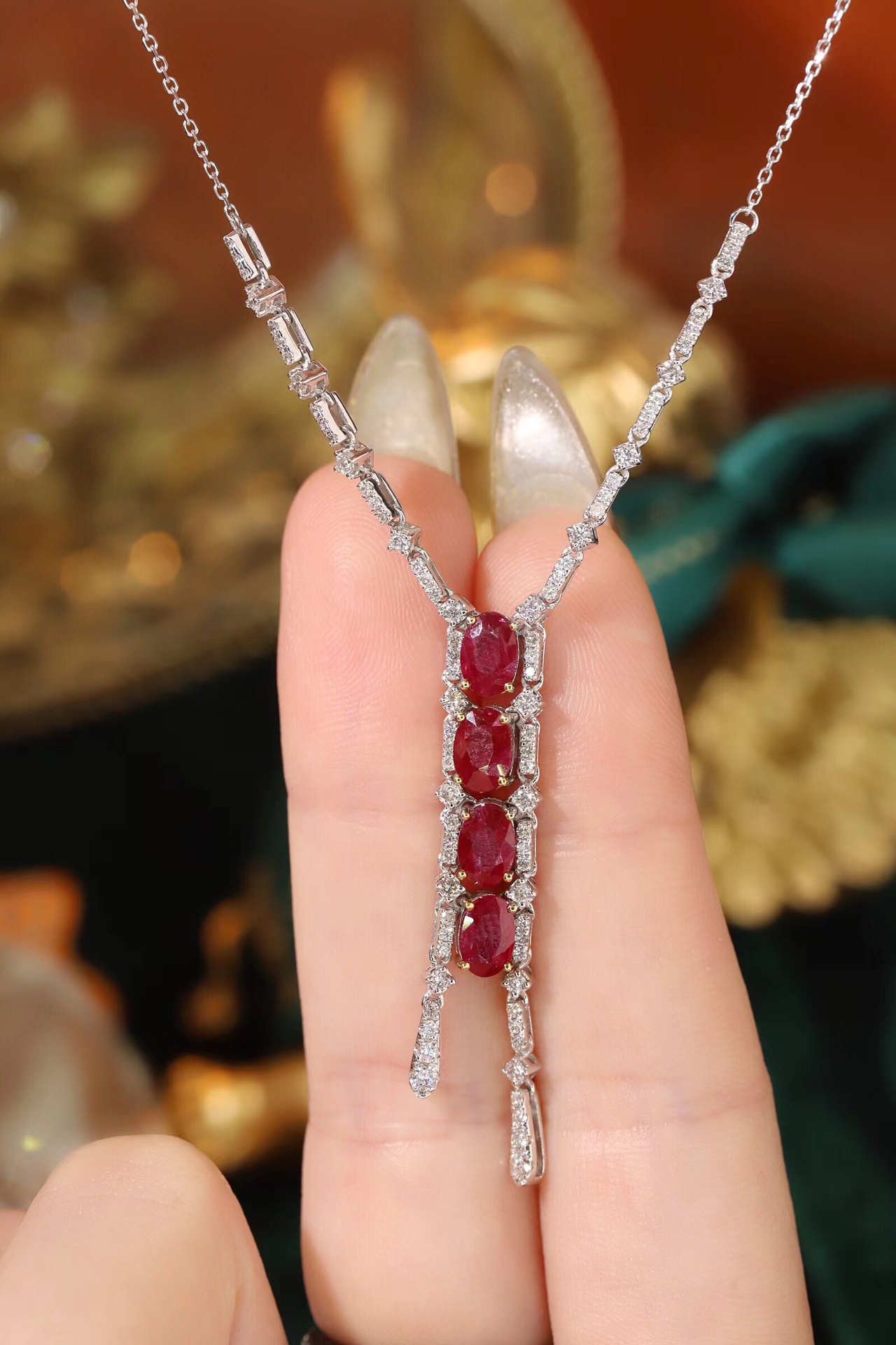 18k gold necklace with  2.40-carat natural ruby and  0.75-carat natural diamond.