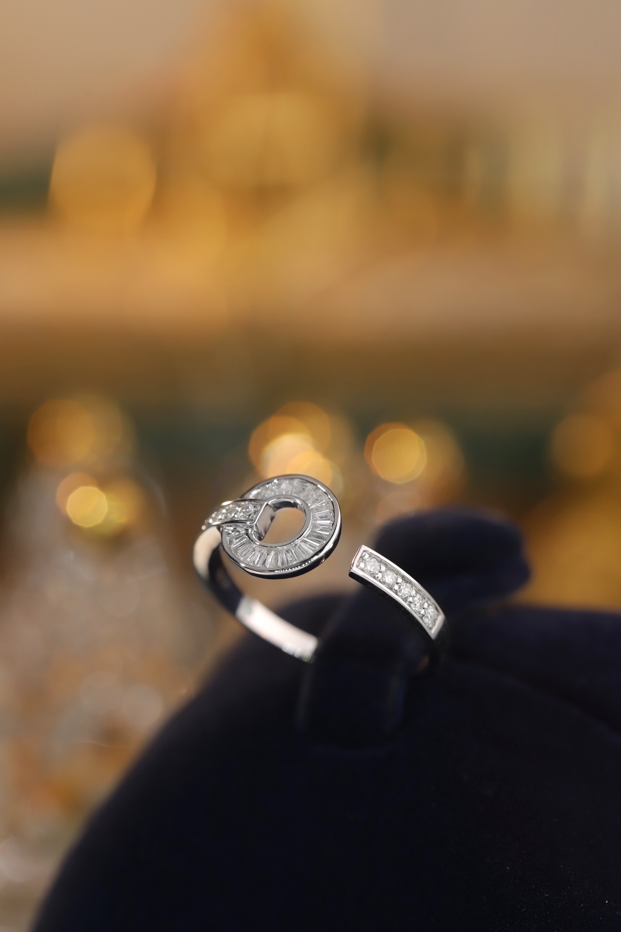 18k gold ring set with a natural diamond; the diamond features a Tapered Baguette cut and weighs 0.40 carats.