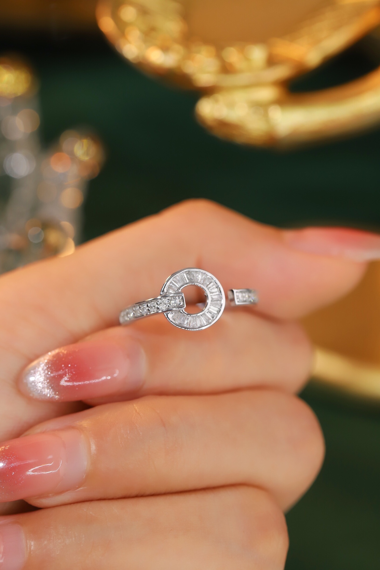 18k gold ring set with a natural diamond; the diamond features a Tapered Baguette cut and weighs 0.40 carats.
