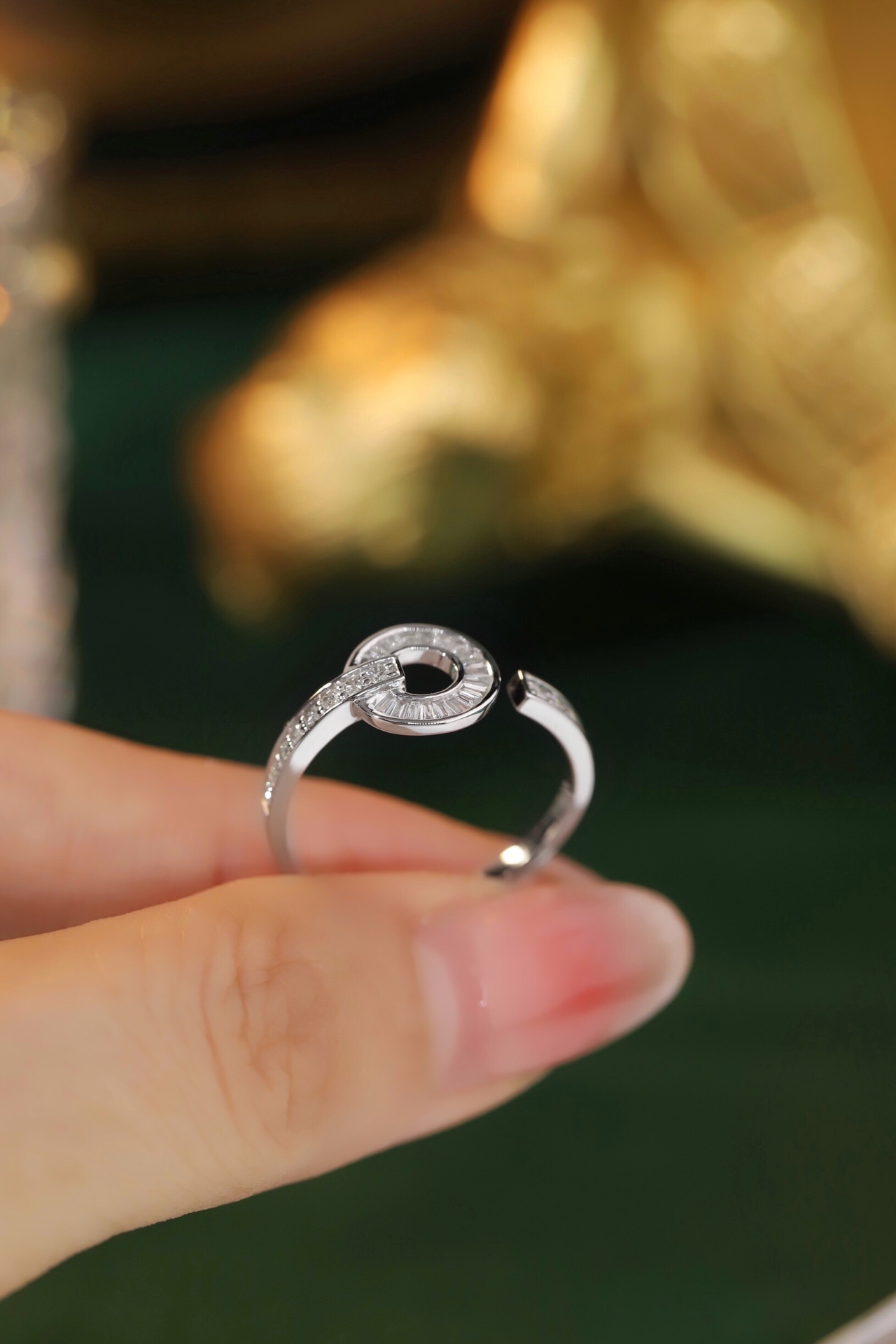 18k gold ring set with a natural diamond; the diamond features a Tapered Baguette cut and weighs 0.40 carats.