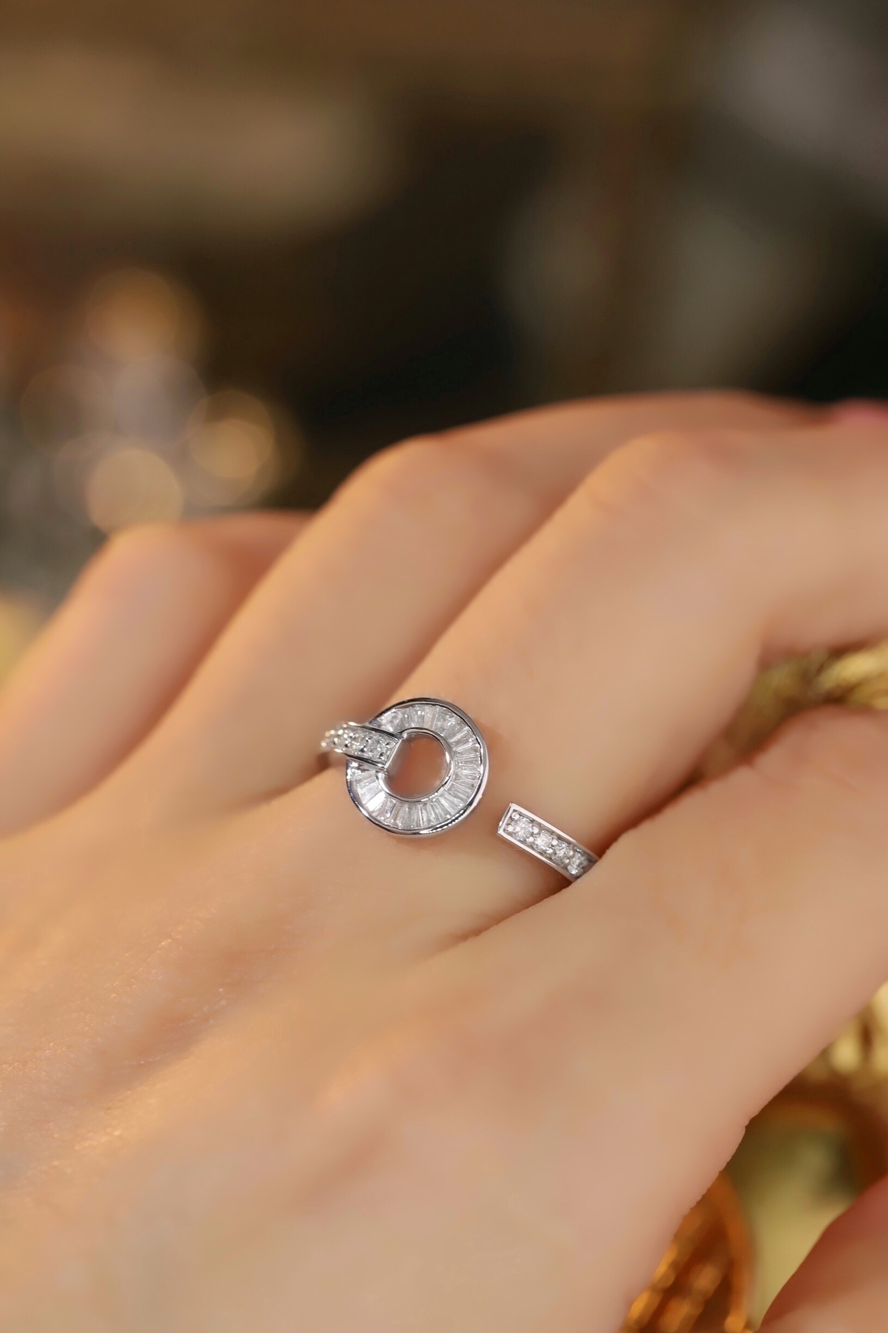 18k gold ring set with a natural diamond; the diamond features a Tapered Baguette cut and weighs 0.40 carats.