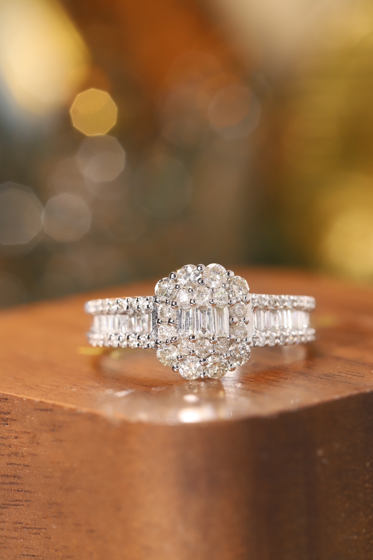 18k gold ring set with a natural diamond; the diamond features a Tapered Baguette cut and weighs 1.00 carats.