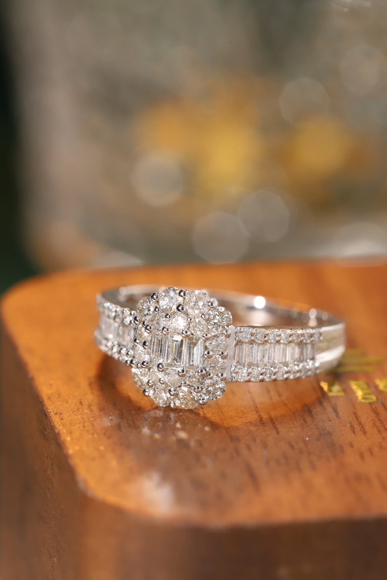 18k gold ring set with a natural diamond; the diamond features a Tapered Baguette cut and weighs 1.00 carats.