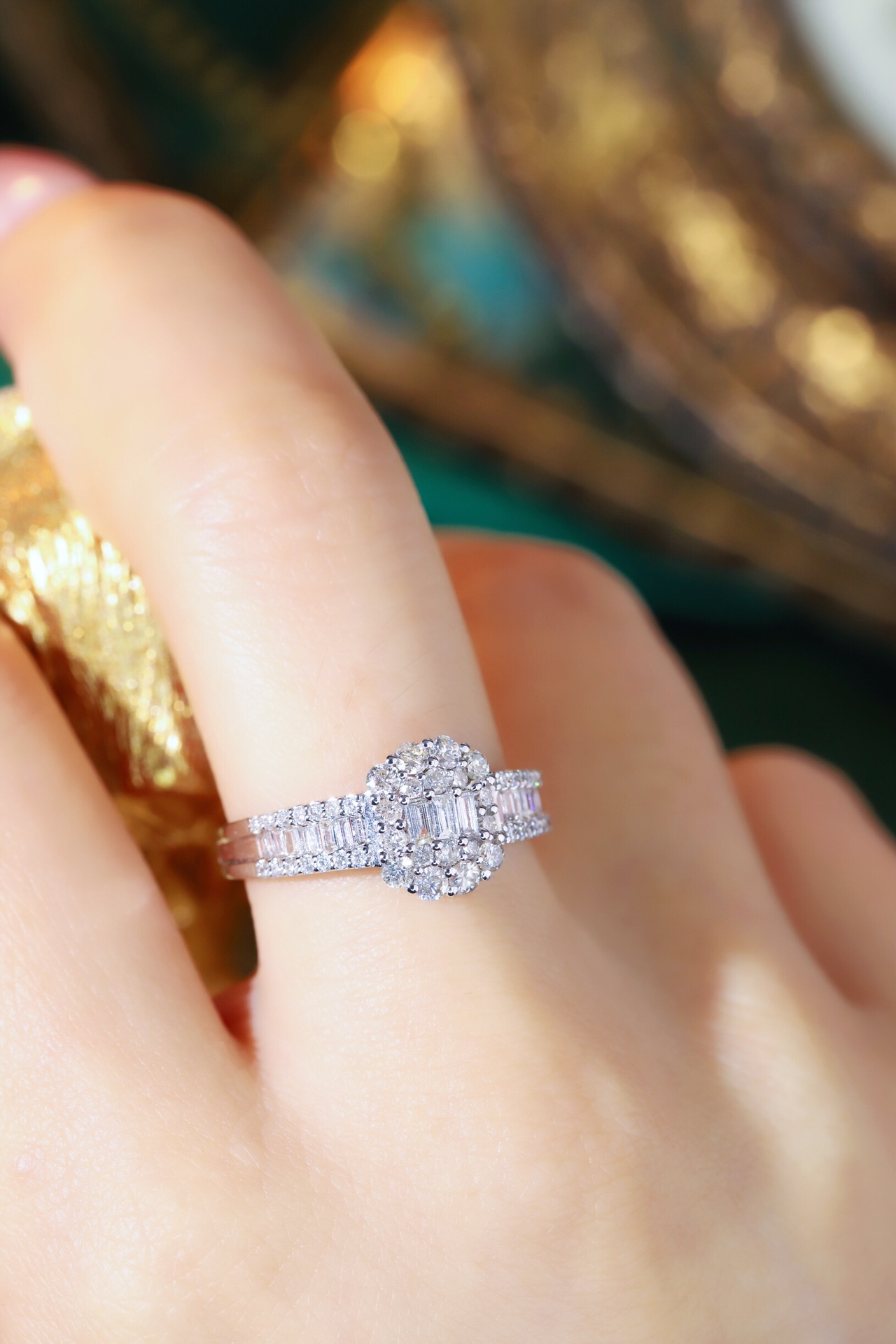 18k gold ring set with a natural diamond; the diamond features a Tapered Baguette cut and weighs 1.00 carats.