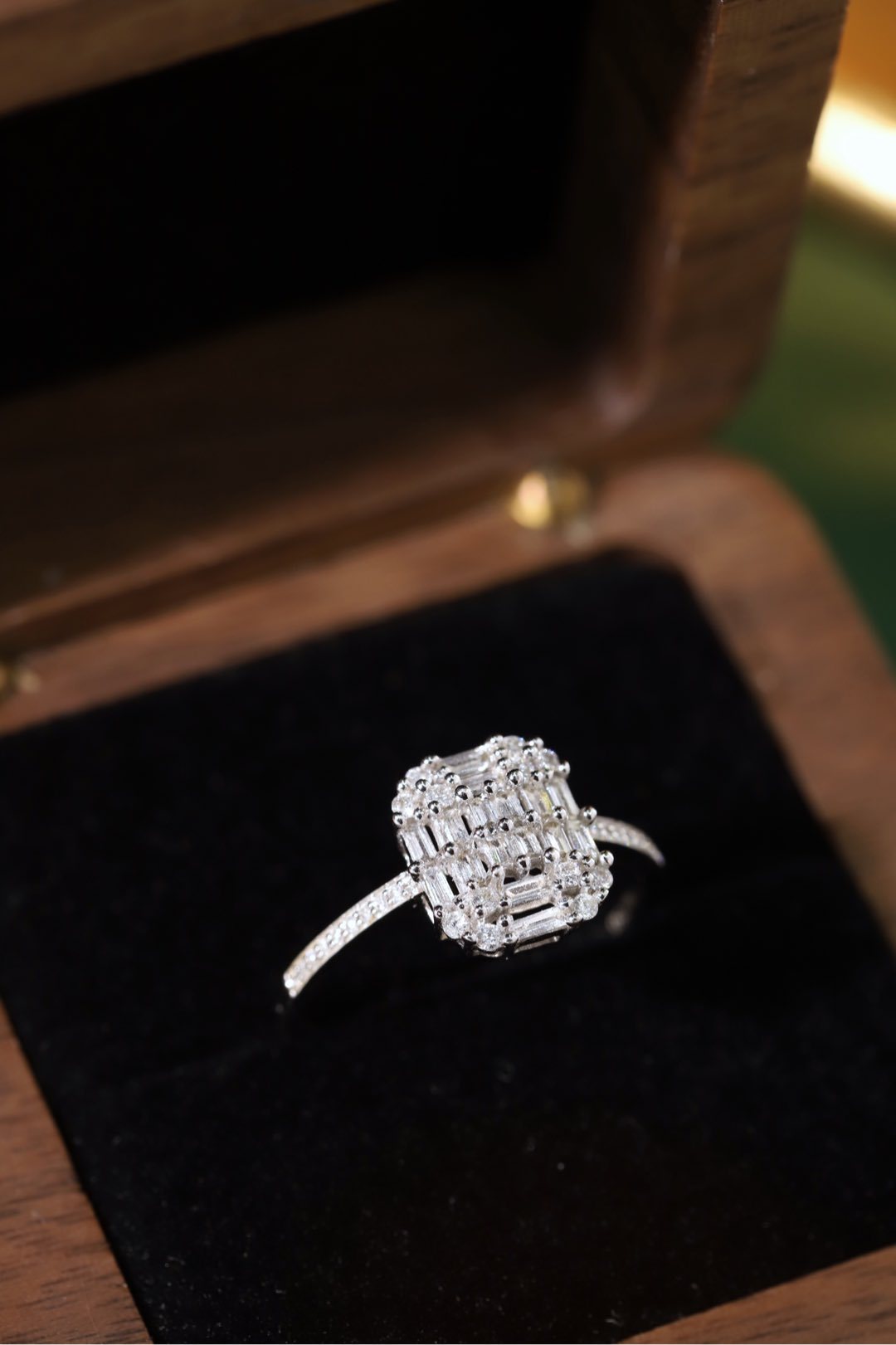 18k gold ring set with a natural diamond; the diamond features a Tapered Baguette cut and weighs 0.50 carats.