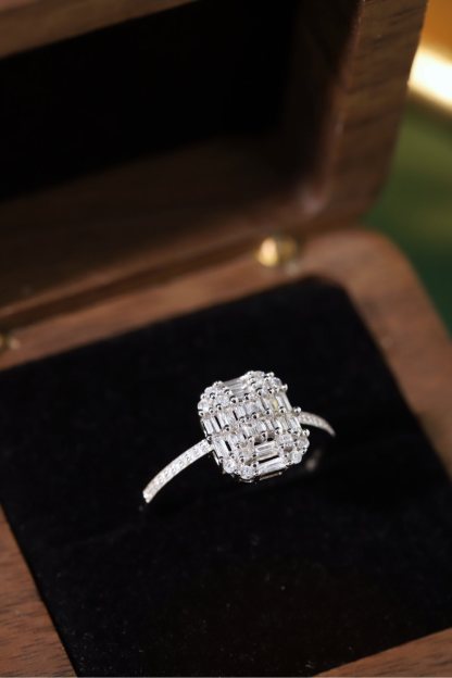 18k gold ring set with a natural diamond; the diamond features a Tapered Baguette cut and weighs 0.50 carats.