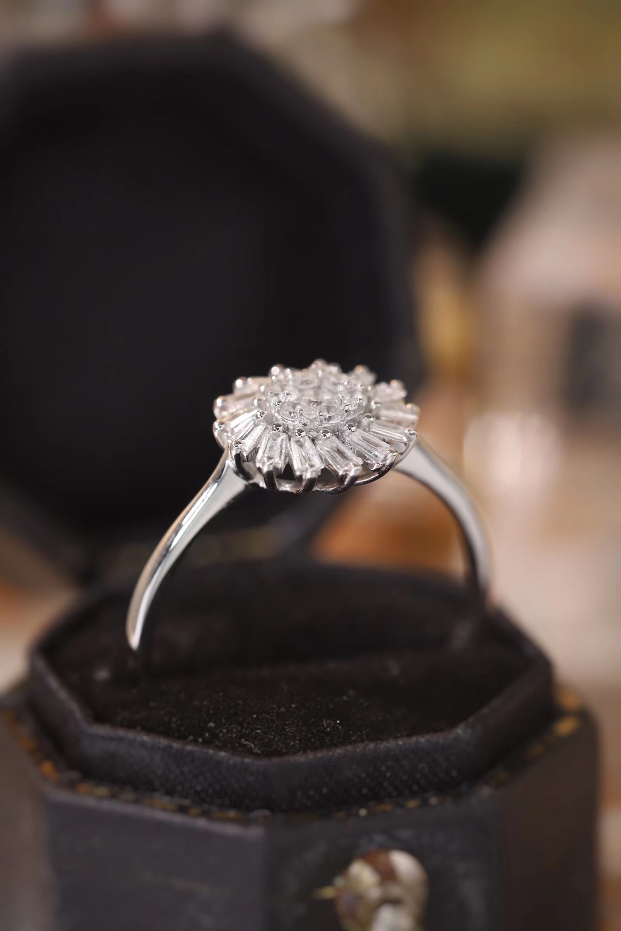 18k gold ring set with a natural diamond; the diamond features a Tapered Baguette cut and weighs 0.40 carats.