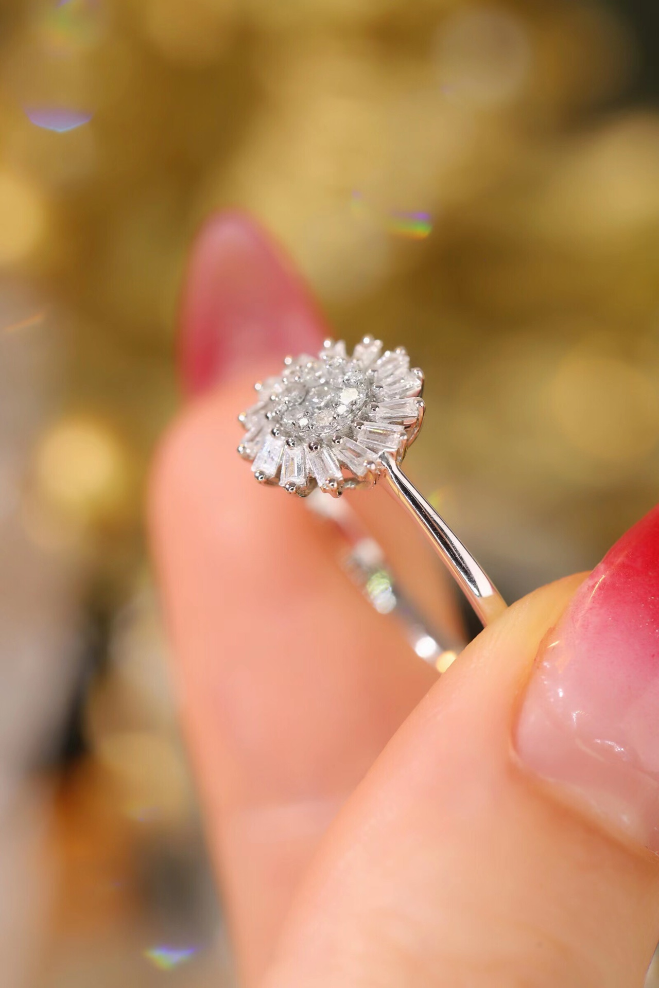18k gold ring set with a natural diamond; the diamond features a Tapered Baguette cut and weighs 0.40 carats.