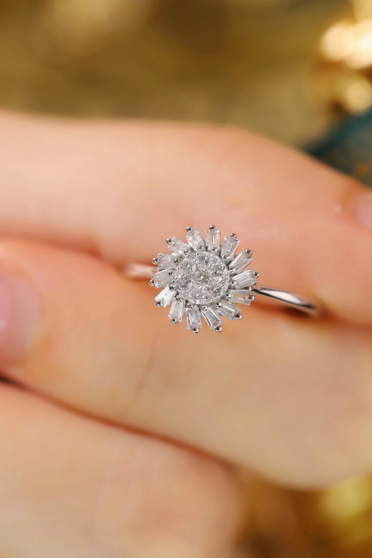 18k gold ring set with a natural diamond; the diamond features a Tapered Baguette cut and weighs 0.40 carats.