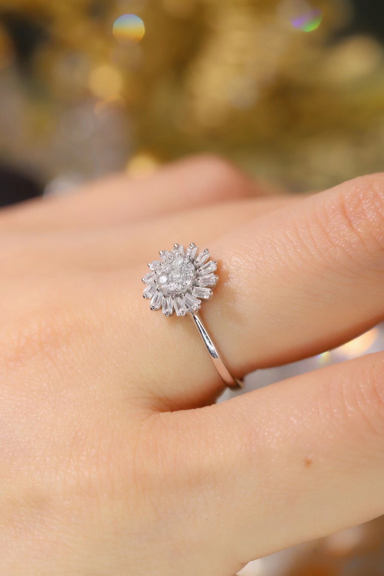 18k gold ring set with a natural diamond; the diamond features a Tapered Baguette cut and weighs 0.40 carats.